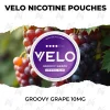 VELO Groovy Grape 10mg nicotine pouch can on ripe red grapes