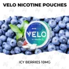 VELO Icy Berries 10mg nicotine pouch can on fresh ripe blueberries